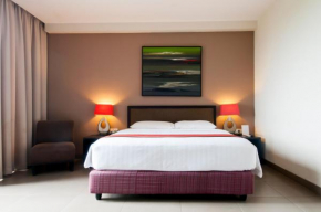 Отель 100 Sunset Kuta Hotel & Ballroom  Kuta